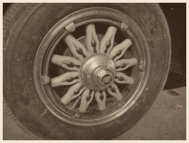Wood-spoke (artillery) wheel with painted, pinstriped spokes